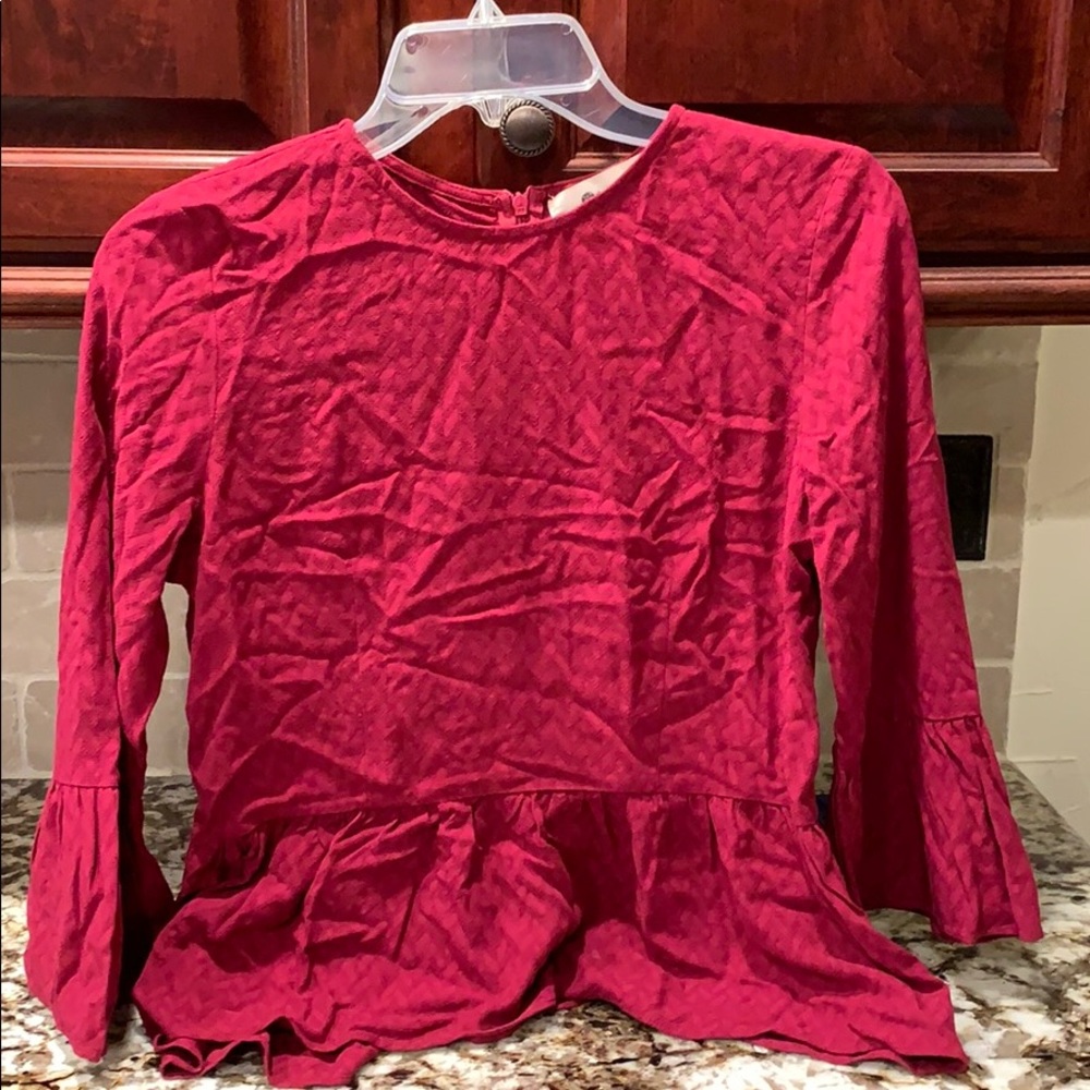 long sleeved peplum top